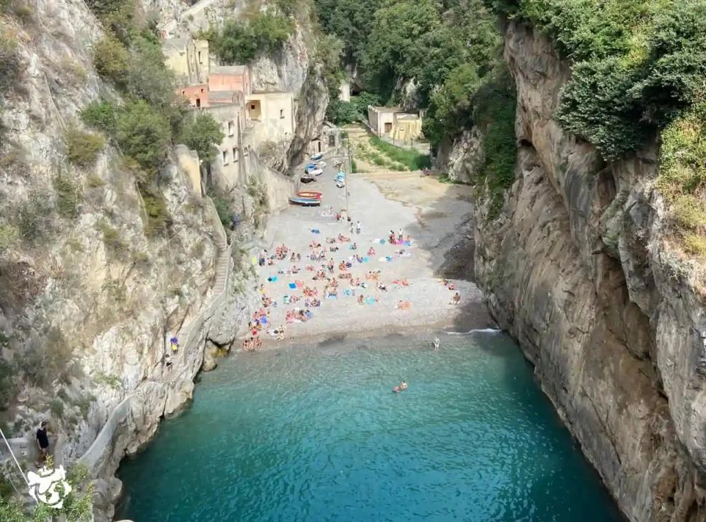 Best beaches Amalfi Coast secluded rocky inlet for swimming