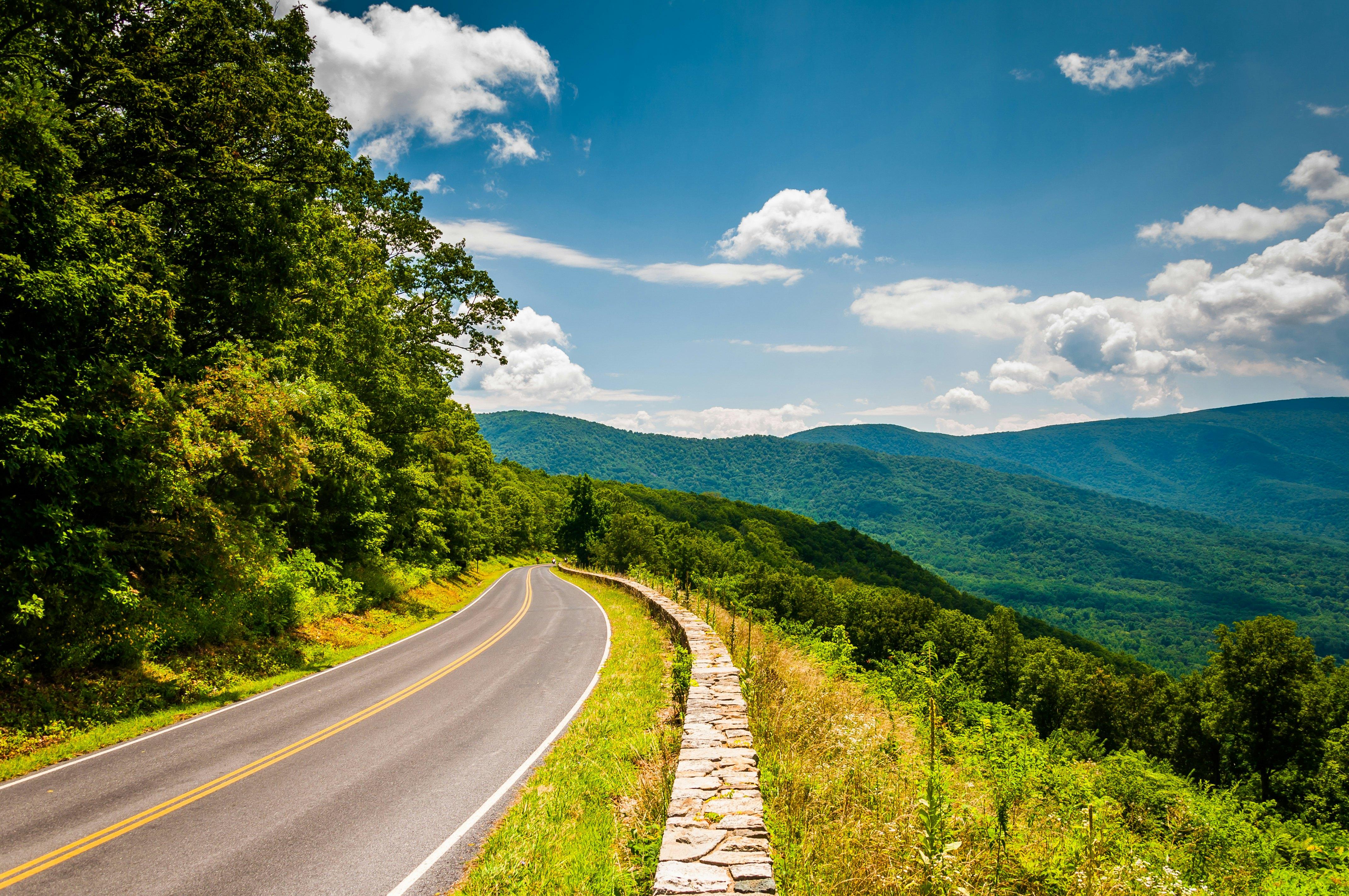Scenic Virginia mountain road winding through green hills