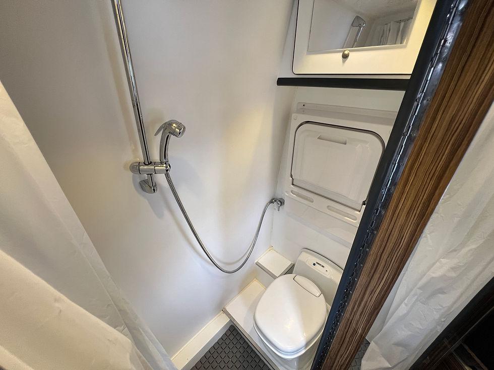 Compact bus bathroom shower setup