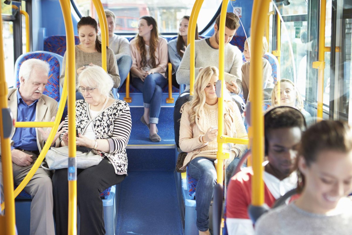 Passengers sitting politely inside bus