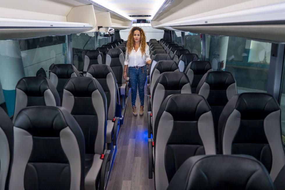 Passenger selecting a comfortable bus seat