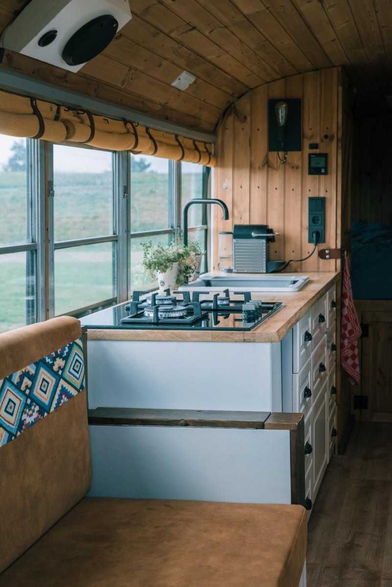 Tiny kitchen inside converted bus