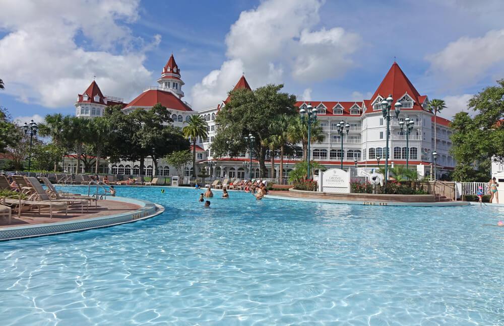 Family relaxing at Disney resort pool