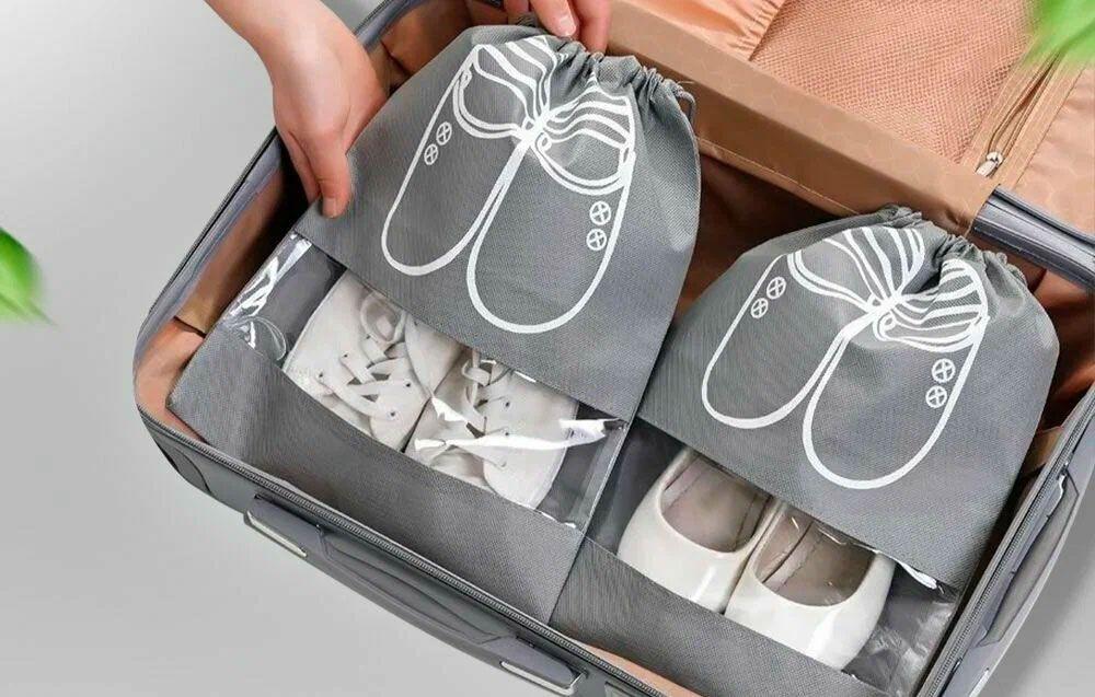 Travel suitcase with shoe bags for clean efficient packing