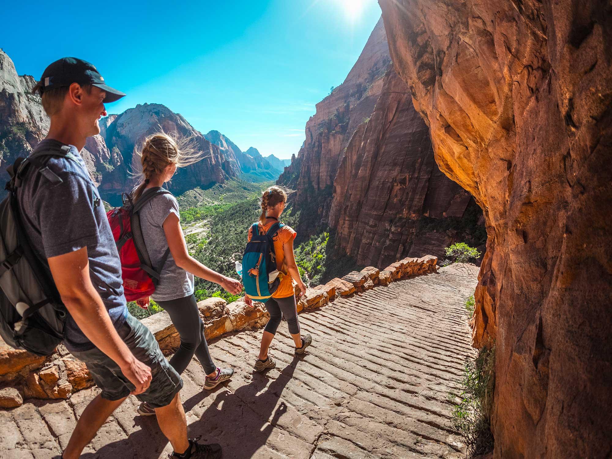 Hikers exploring a canyon trail in a national park