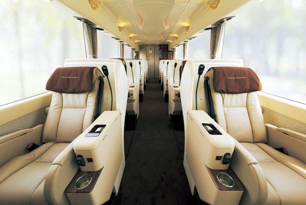 Luxury coach bus interior with premium seats