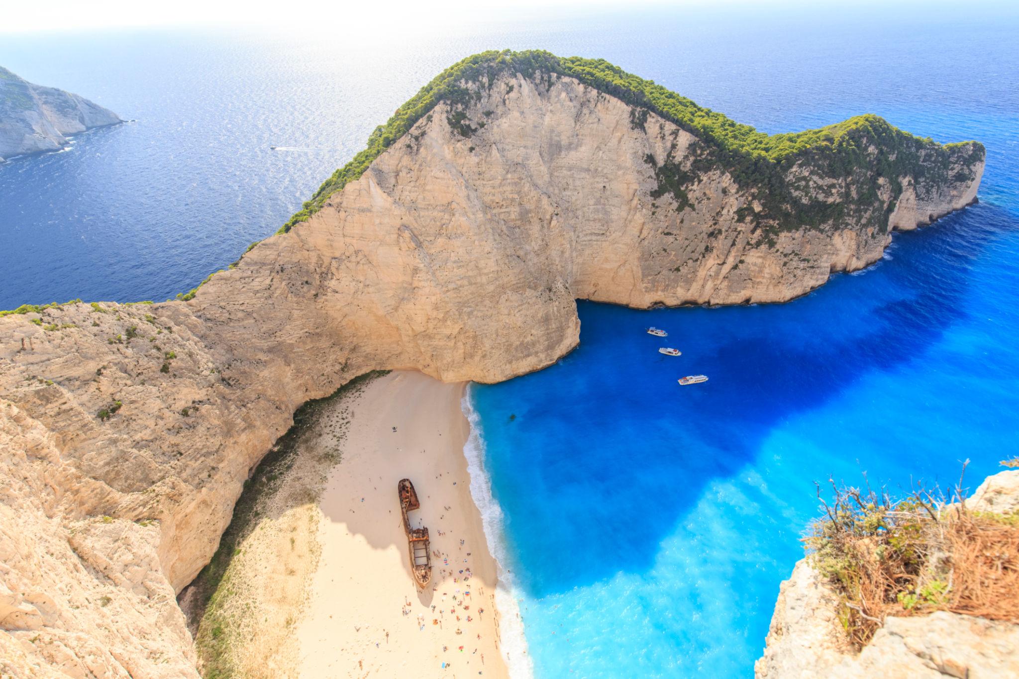 Navagio Beach shipwreck below Greek cliffs