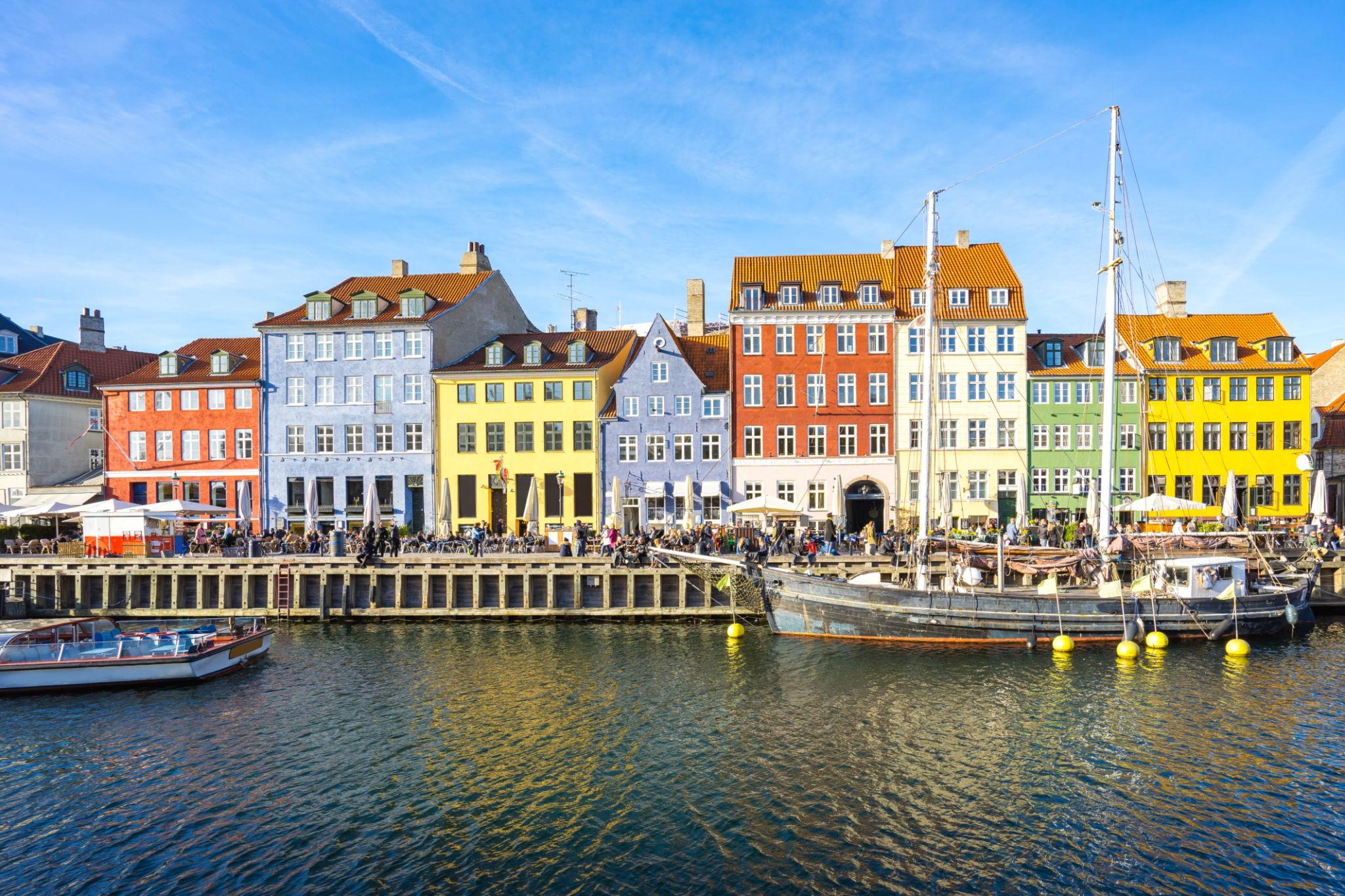 Copenhagen travel guide view of colourful Nyhavn canal buildings