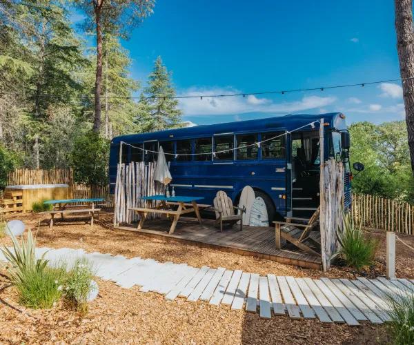 Bus campsite with outdoor seating area