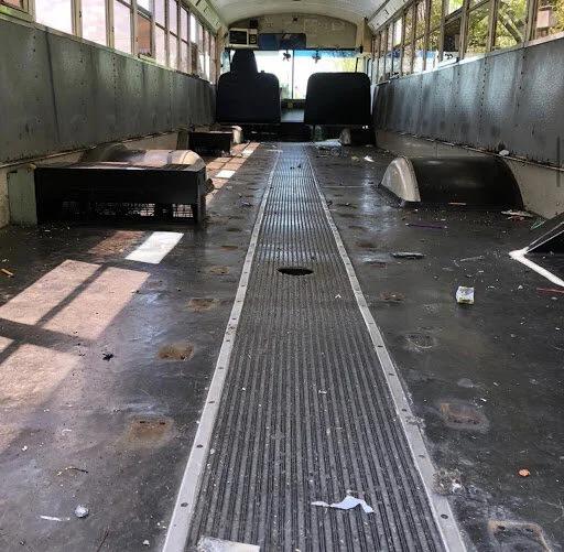 Empty bus interior after seat removal