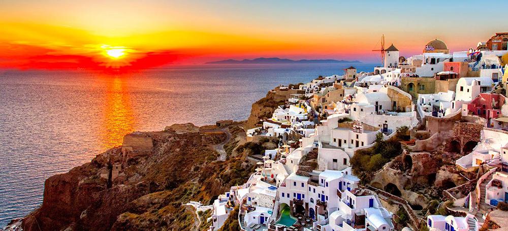 Santorini cliffs above blue sea