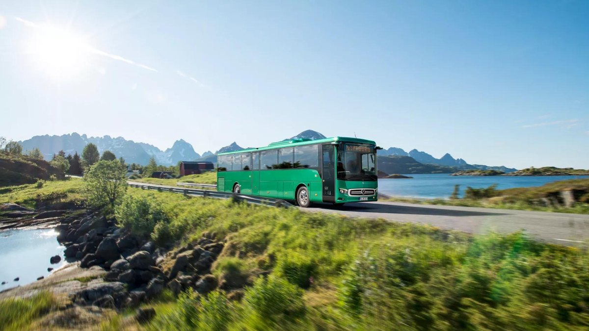Electric bus on scenic green route