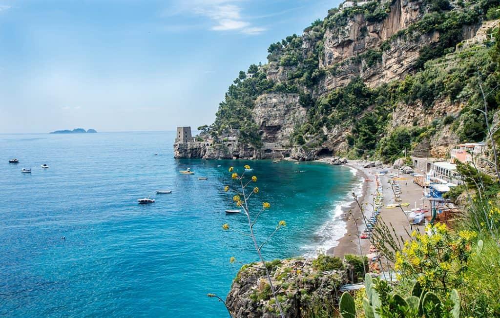 Best beaches Amalfi Coast quiet turquoise cove below cliffs
