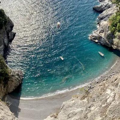 Best beaches Amalfi Coast hidden cove with clear blue water