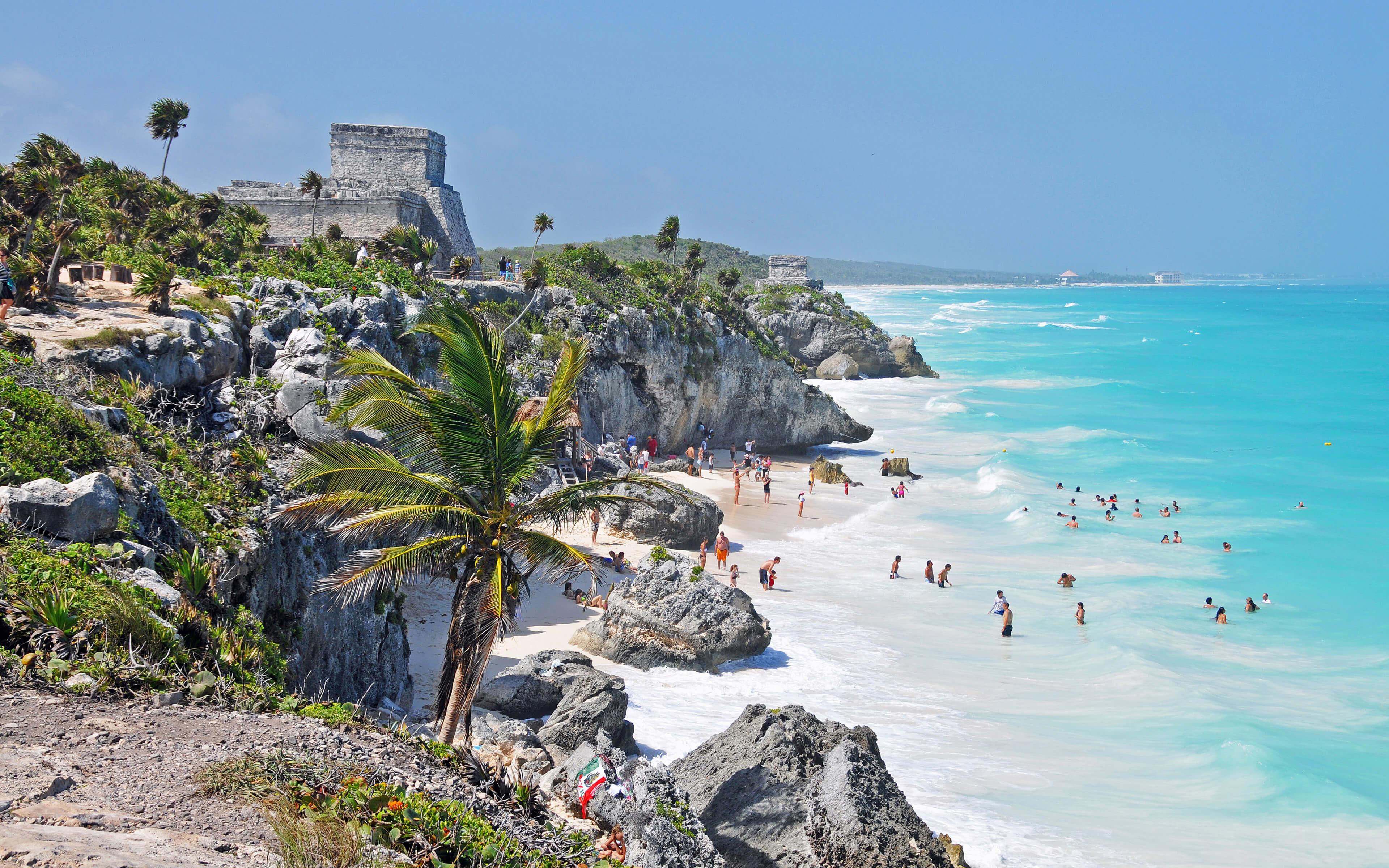 Tulum Beach with Maya ruins and Caribbean sea