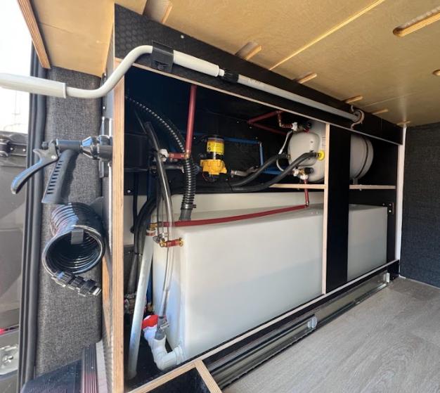 Bus conversion water tank plumbing