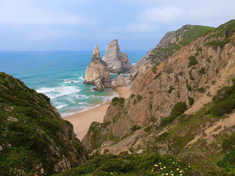 Hidden beaches Europe with rugged cliffs and a wild coastal beach